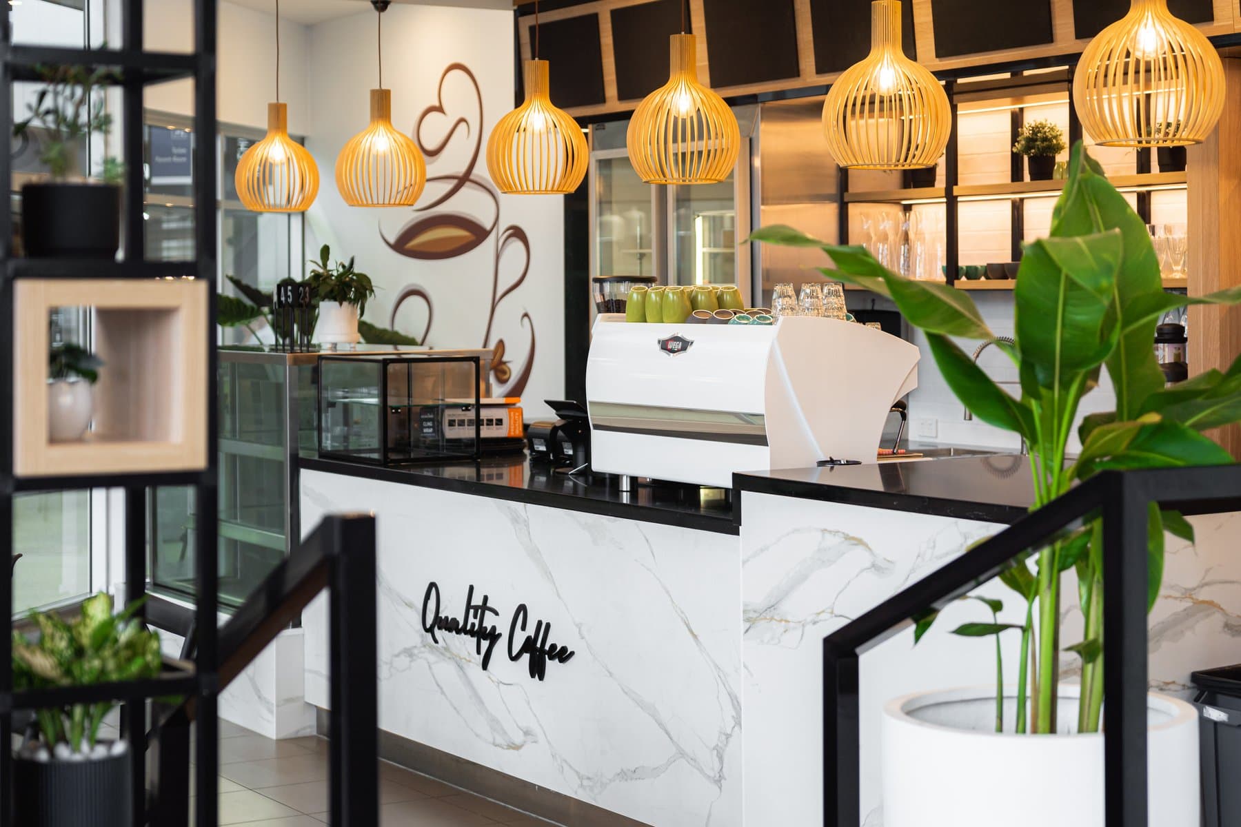 The founders of Quality Coffee in their café